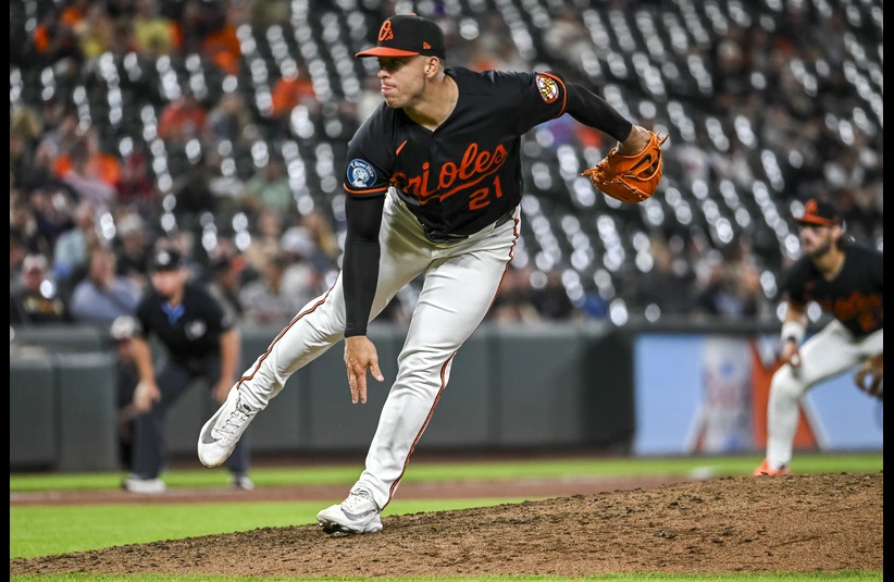 Baltimore Orioles closer Ryan Helsley throws a pitch