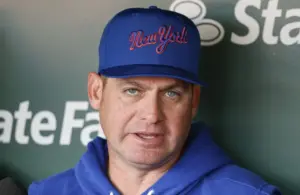 New York Mets manager Carlos Mendoza (64) speaks before a baseball game.