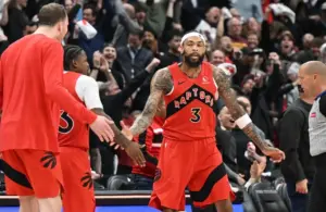 Toronto Raptors forward Brandon Ingram (3) is greeted by teammates