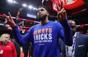 New York Knicks center Karl-Anthony Towns (32) celebrates after a victory.