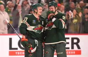 Minnesota Wild forward Kirill Kaprizov (97) and forward Vladimir Tarasenko (91) celebrate a series win.