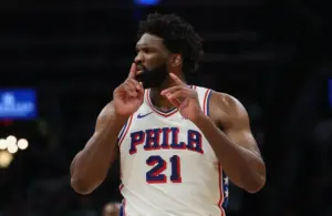 Philadelphia 76ers center Joel Embiid (21) silences the crowd.