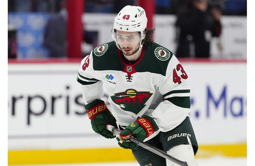 May 3, 2026; Denver, Colorado, USA; Minnesota Wild defenseman Quinn Hughes (43) warms up before game one against the Colorado Avalanche of the second round of the 2026 Stanley Cup Playoffs at Ball Arena. Mandatory Credit: Ron Chenoy-Imagn Images