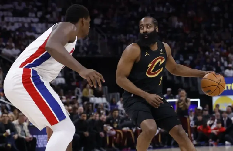 Cleveland Cavaliers guard James Harden (1) dribbles defended by Detroit Pistons center Jalen Duren (0).