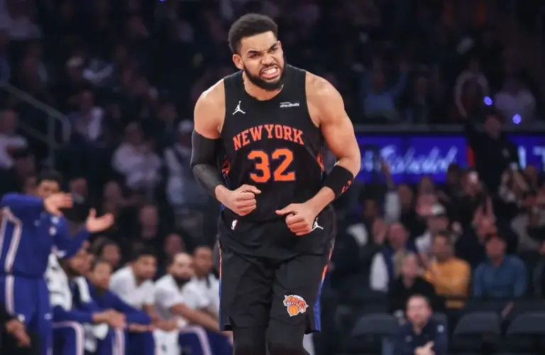 New York Knicks center Karl-Anthony Towns (32) celebrates after scoring against the Philadelphia 76ers.