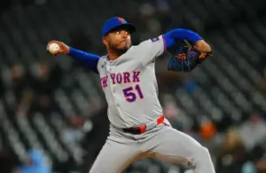 New York Mets starting pitcher Freddy Peralta (51) delivers a pitch in the fourth inning.