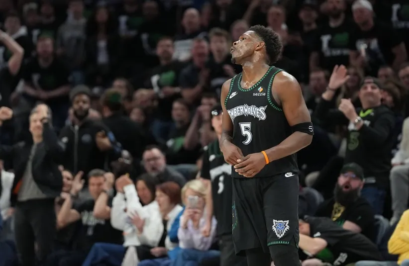 Minnesota Timberwolves guard Anthony Edwards (5) reacts to missing a shot.