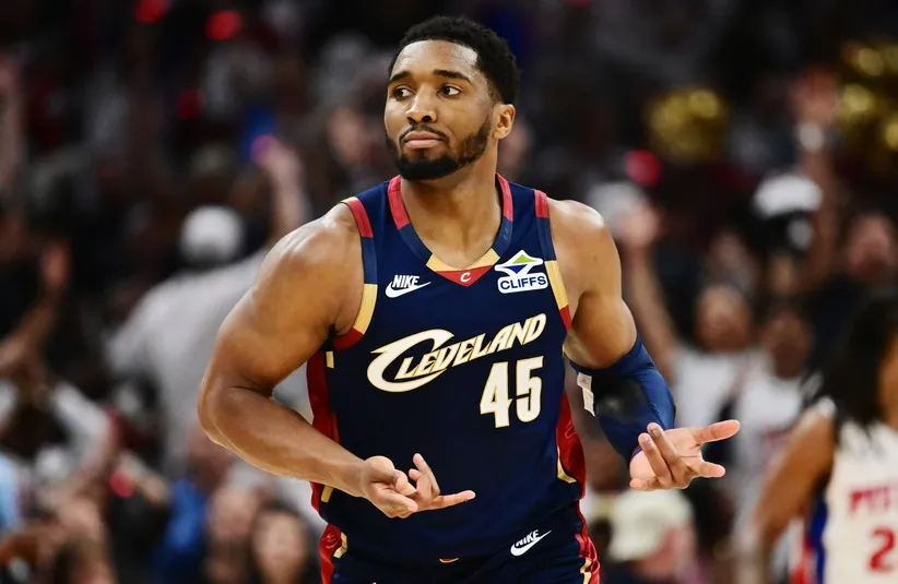 Cleveland Cavaliers guard Donovan Mitchell (45) celebrates after hitting a three point basket.