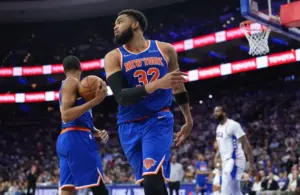 New York Knicks center Karl-Anthony Towns (32) reacts.