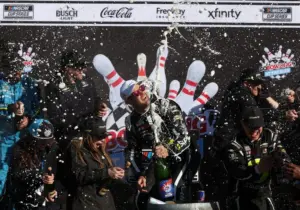 May 10, 2026; Watkins Glen, New York, USA; NASCAR Cup Series driver Shane Van Gisbergen celebrates in victory lane after winning the Go Bowling at The Glen at Watkins Glen International.