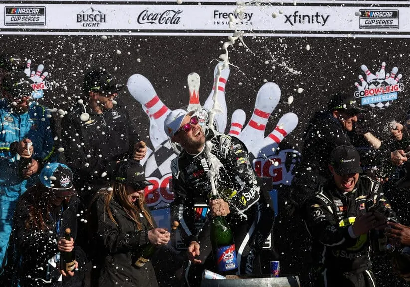 May 10, 2026; Watkins Glen, New York, USA; NASCAR Cup Series driver Shane Van Gisbergen celebrates in victory lane after winning the Go Bowling at The Glen at Watkins Glen International.