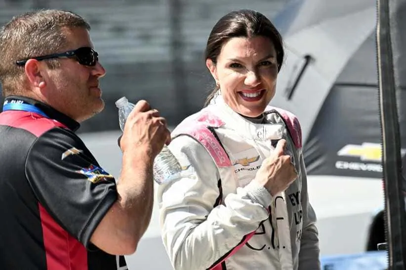 HMD Motorsports with AJ Foyt Racing driver Katherine Legge (11) talks in her pit box Tuesday, May 12, 2026, during practice for the 110th running of the Indianapolis 500 at Indianapolis Motor Speedway.