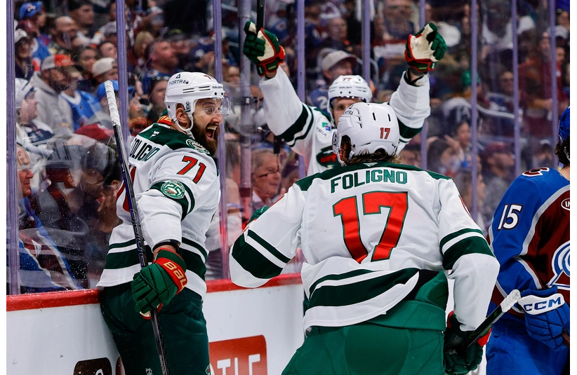 May 13, 2026; Denver, Colorado, USA; Minnesota Wild left wing Nick Foligno (71) celebrates his goal with left wing Marcus Foligno (17) and center Nico Sturm (78) in the first period against the Colorado Avalanche in game five of the second round of the 2026 Stanely Cup Playoffs at Ball Arena. Mandatory Credit: Isaiah J. Downing-Imagn Images