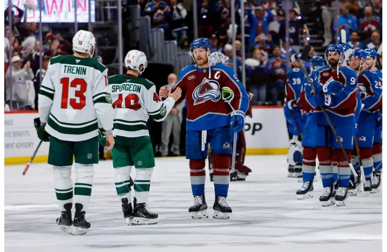 Wild and Avalanche shaking hands after series end