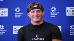 New York Giants quarterback Jaxson Dart (6) speaks at a press conference.