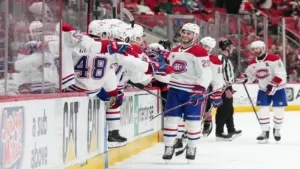 Montreal Canadiens left wing Juraj Slafkovsky (20) celebrates with teammates.