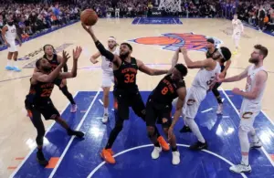 New York Knicks center Karl-Anthony Towns (32) grabs a rebound.
