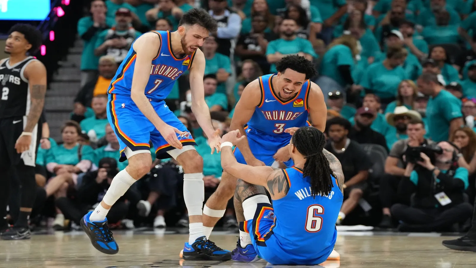 Oklahoma City Thunder center Chet Holmgren (7), guard Jared McCain (3) and forward Jaylin Williams (6) react.
