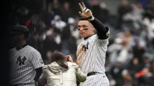 New York Yankees right fielder Aaron Judge (99) reacts after hitting a walk off two run home run.