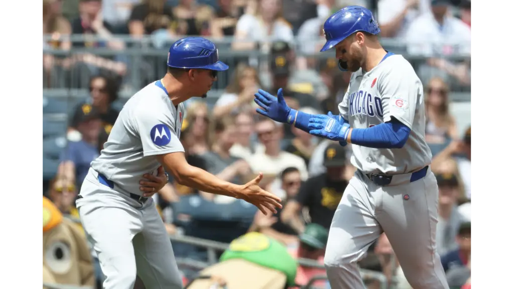 Cubs players celebrating in Pittsburgh. They play the Yankees 31 July to 2 August. Mandatory Credit: Charles LeClaire-Imagin Images