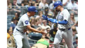 Cubs players celebrating in Pittsburgh