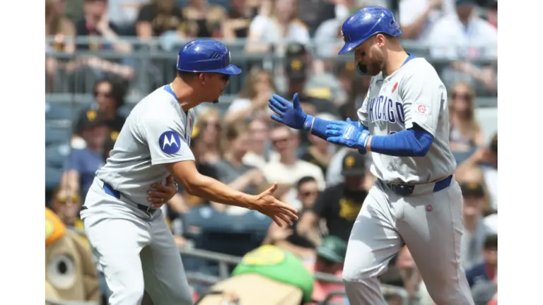 Cubs players celebrating in Pittsburgh