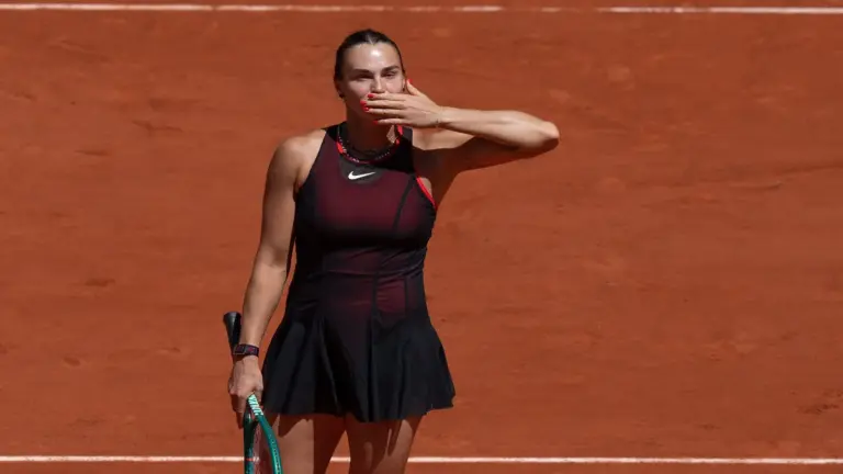 Aryna Sabalenka celebrates winning her match.