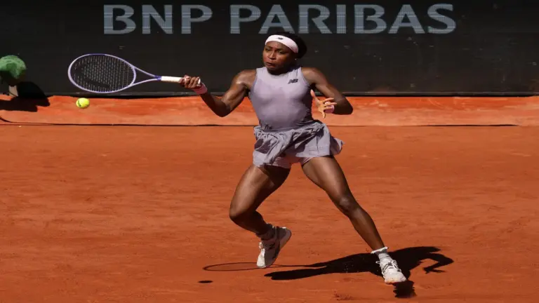 Coco Gauff of the United States returns a shot.