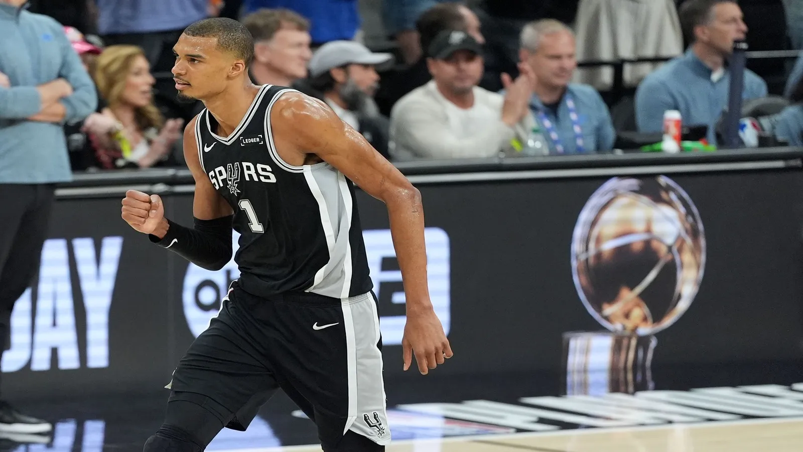 San Antonio Spurs forward Victor Wembanyama (1) reacts in the first half.