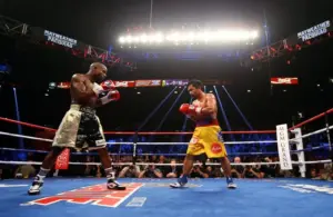 Manny Pacquiao (right) against Floyd Mayweather during their boxing bout.