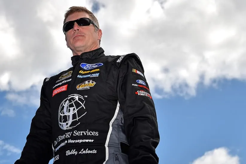Feb 21, 2016; Daytona Beach, FL, USA; NASCAR Sprint Cup Series driver Bobby Labonte (32) before the Daytona 500 at Daytona International Speedway.