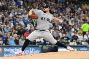 May 10, 2026; Milwaukee, Wisconsin, USA; New York Yankees starting pitcher Carlos Rodon (55) throws a pitch in the first inning against the Milwaukee Brewers at American Family Field.