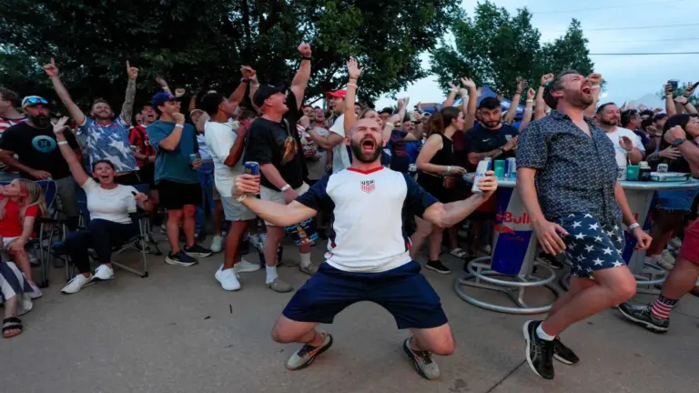 Trent Jameson cheers after a goal with other soccer fans during a watch party at Skinny Slim's in Oklahoma City for the FIFA World Cup game between the United State's men's team and, Friday, June 12, 2026.