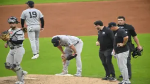 Jun 9, 2026; Cleveland, Ohio, USA; New York Yankees starting pitcher Gerrit Cole (45) rests his hands on his knees in the third inning against the Cleveland Guardians at Progressive Field.