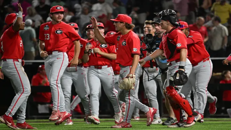 Jun 16, 2026; Omaha, NE, USA; The Georgia Bulldogs team celebrates the win against the Texas Longhorns at Charles Schwab Field.
