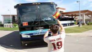 Jun 5, 2026; Chattanooga, Tennessee, USA; Spain supporter Phillip Roberts waves a flag as the Spain men's national team drives by after arriving for the 2026 FIFA World Cup at Chattanooga Metropolitan Airport.