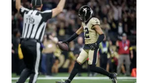 Chris Olave walking into the endzone