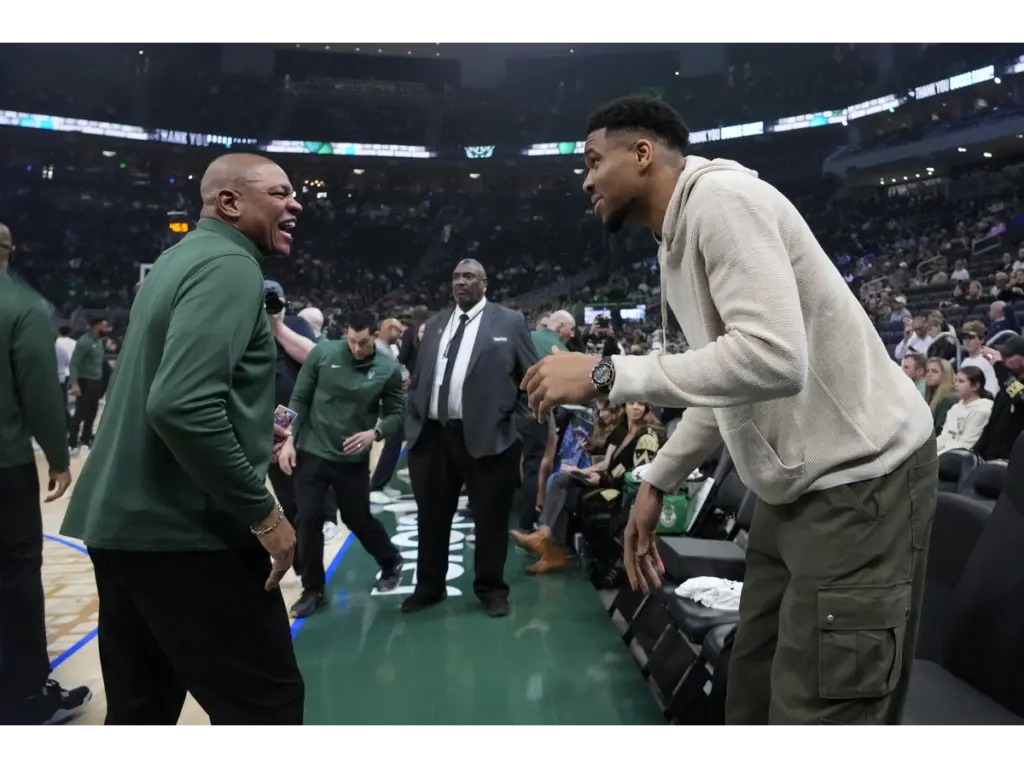 Apr 10, 2026; Milwaukee, Wisconsin, USA; Milwaukee Bucks forward Giannis Antetokounmpo (34) talks with head coach Doc Rivers prior to the game against the Brooklyn Nets at Fiserv Forum. Mandatory Credit: Jeff Hanisch-Imagn Images