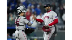 Aroldis Chapman celebrating with Red Sox catcher
