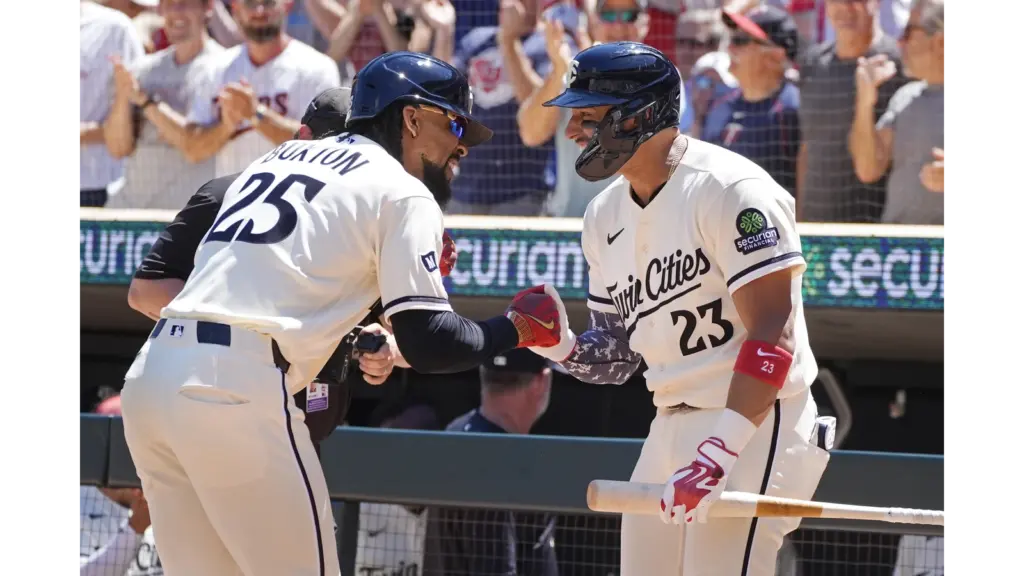 Byron Buxton celebrating with teammate. He left the game today against the Yankees with an injury.