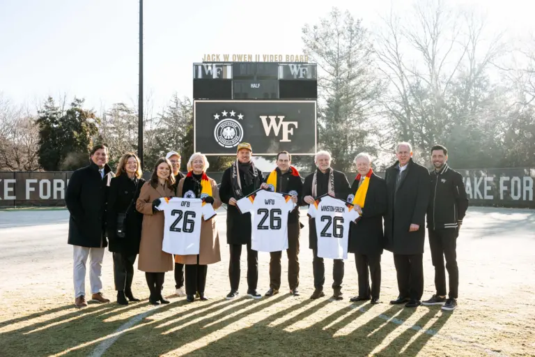 Dec 7, 2025; Winston-Salem, North Carolina, USA; Wake Forest University President Dr. Susan Wente, German head coach Julian Nagelsmann, Wake Forest University vice president and director of athletics John Currie, Director of the German national team Rudi Voller, and members of the German Football Association pose for a portrait at W. Dennie Spry Soccer Stadium. The German Football Association chose Wake Forest University as its Team Base Camp for FIFA World Cup 2026. Mandatory Credit: Wake Forest University via Imagin Images