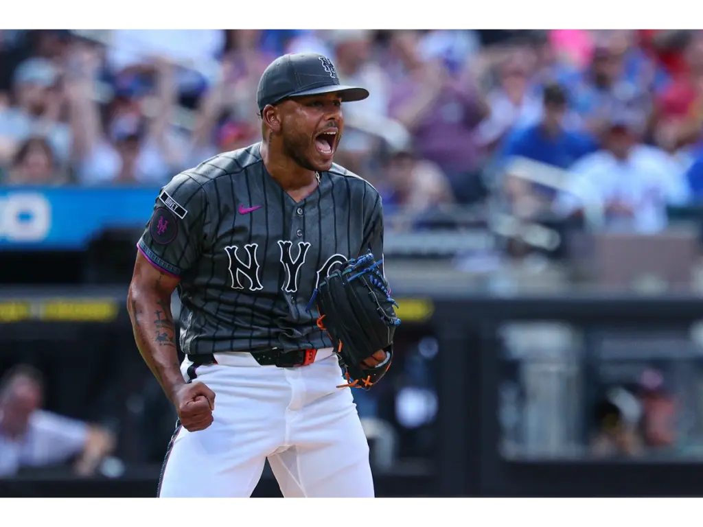 Jul 11, 2026; New York City, New York, USA; New York Mets pitcher Freddy Peralta (51) reacts after recording a strike out to end the top of the second inning against the Boston Red Sox at Citi Field. Mandatory Credit: Vincent Carchietta-Imagn Images