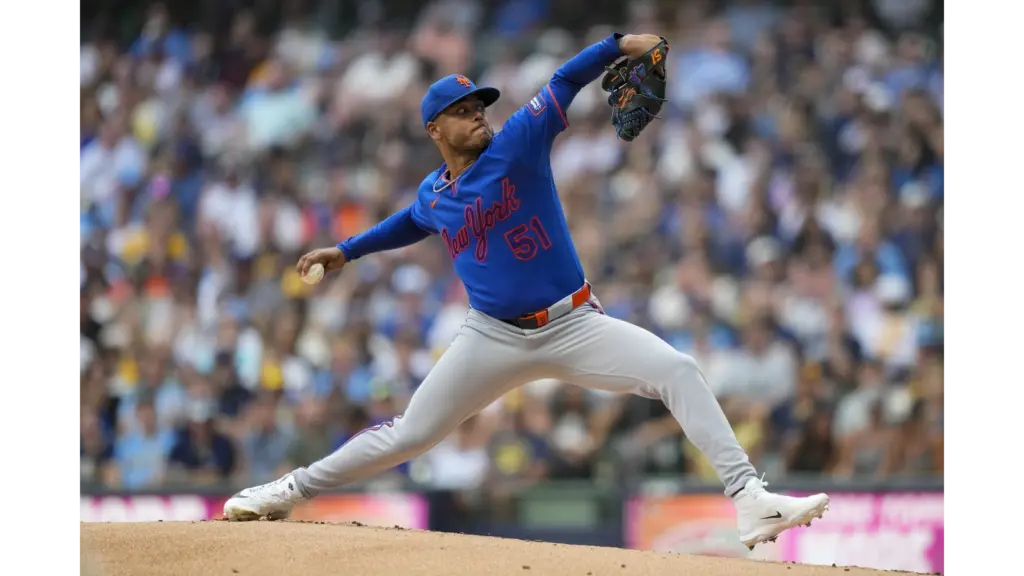 Mets Pitcher Freddy Peralta pitching in Milwaukee. He is not on the Mets anymore, instead he is on the Tampa Bay Rays, the rival of the Yankees.