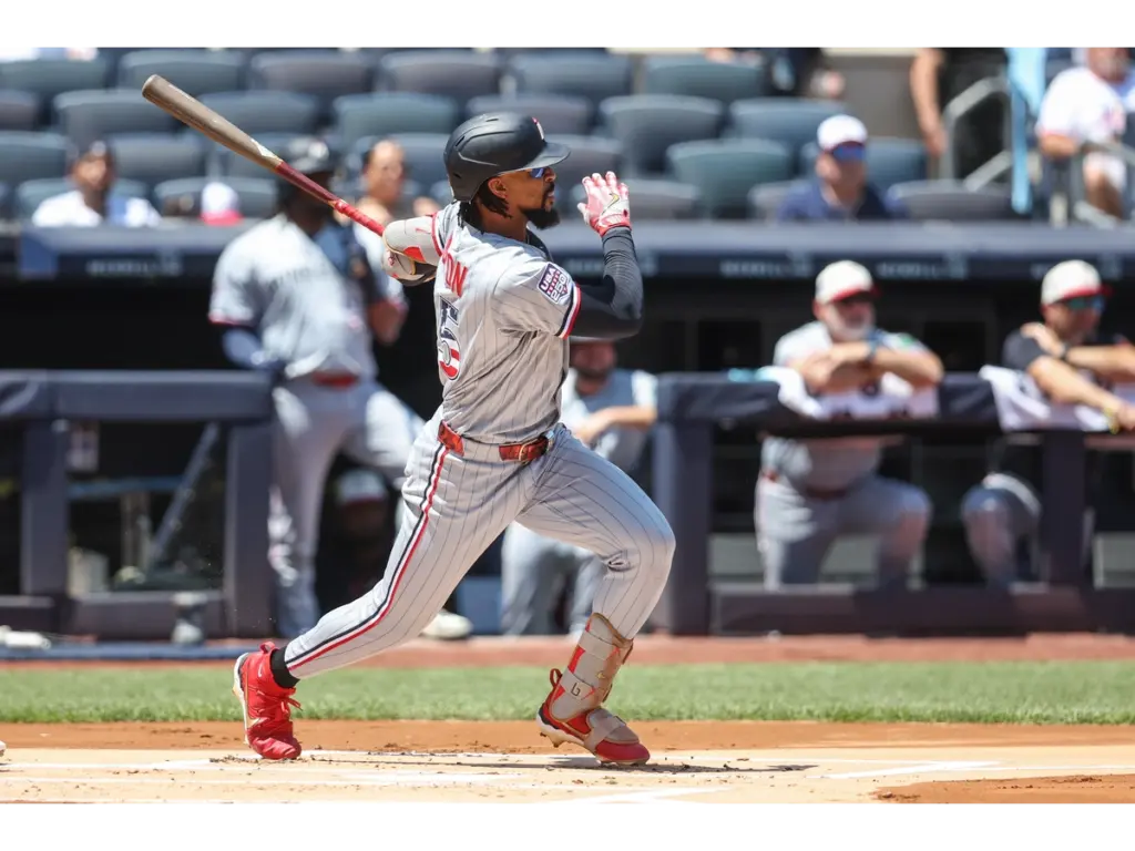 Jul 4, 2026; Bronx, New York, USA; Minnesota Twins center fielder Byron Buxton (25) hits an RBI double in the first inning against the New York Yankees at Yankee Stadium. Mandatory Credit: Wendell Cruz-Imagn Images