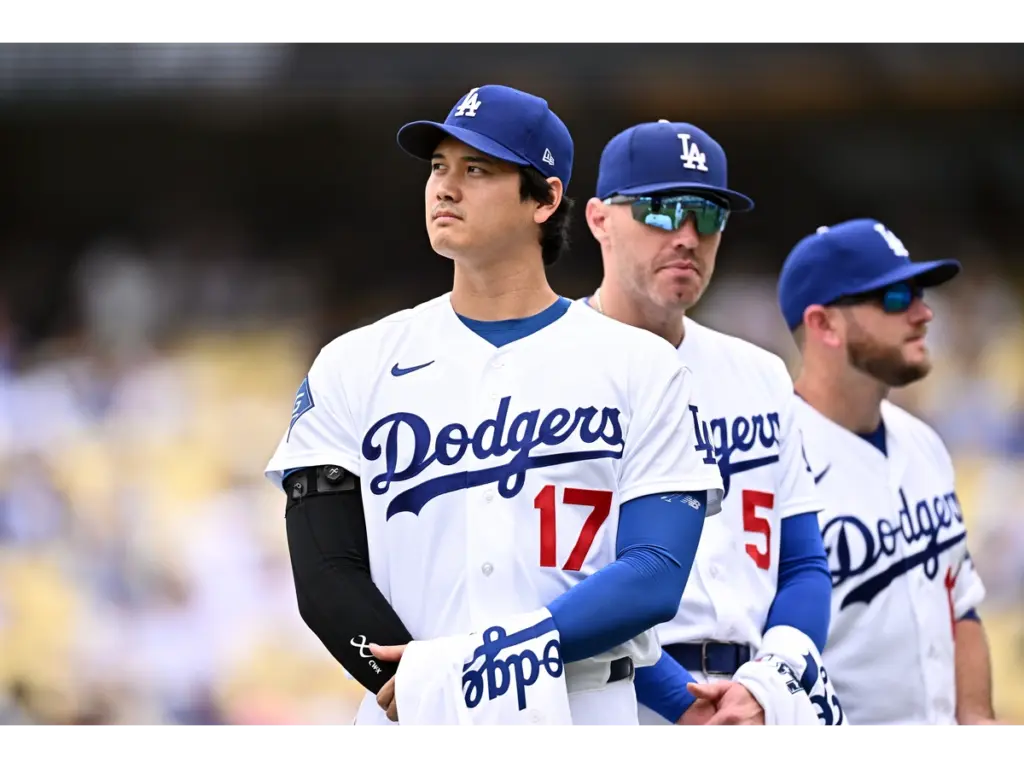 Jul 12, 2026; Los Angeles, California, USA; Los Angeles Dodgers two-way player Shohei Ohtani (17) receives his All-Star game jerseys before the game against the Arizona Diamondbacks at Dodger Stadium. Mandatory Credit: William Liang-Imagn Images