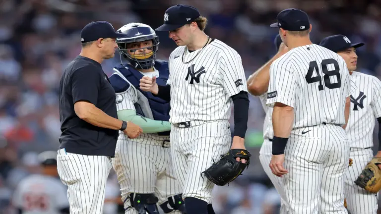 Jun 30, 2026; Bronx, New York, USA; New York Yankees manager Aaron Boone (17) removes starting pitcher Cam Schlittler (31) from the game against the Detroit Tigers during the fifth inning at Yankee Stadium.