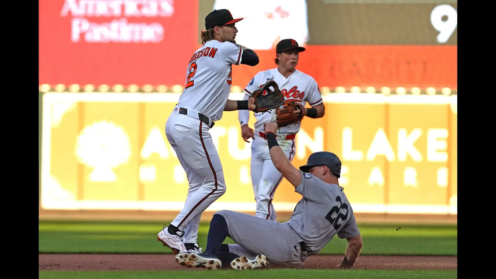 Aug 19, 2026; Baltimore, Maryland, USA; New York Yankees designated hitter Ben Rice (22) forced out on the front end of a first inning double play by Baltimore Orioles shortstop Gunnar Henderson (2) at Oriole Park at Camden Yards. Mandatory Credit: Mitch Stringer-Imagn Images