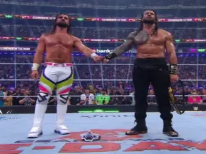 Seth Rollins and Roman Reigns with a Shield fist bump to end SummerSlam 2026.