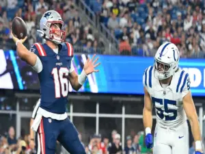 Colts rookie Caden Curry goes after Patriots QB during week 1 pre-season game.