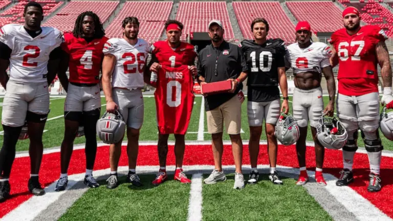 The 7 Captains at Ohio State with Head Coach Ryan Day.